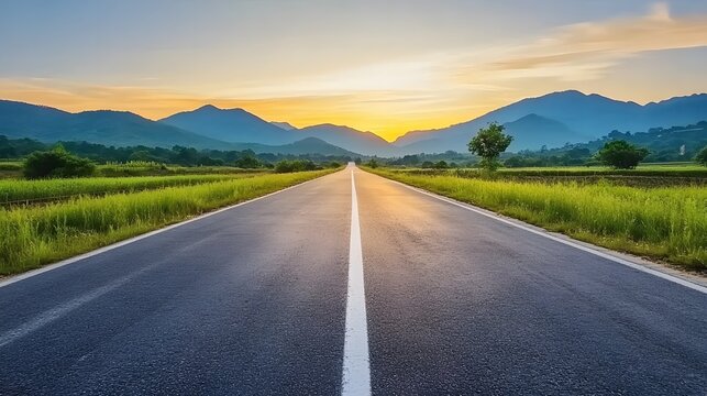 Wide open road stretching into the horizon with a breathtaking sunset, symbolizing new beginnings, future possibilities, and success. Empty asphalt highway leading toward distant mountains bathed - Powered by Adobe