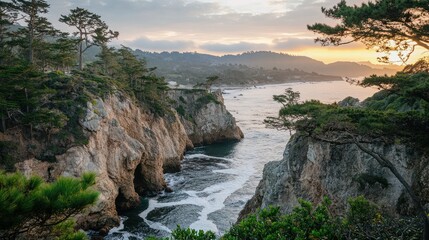 Dramatic coastal sunset view with rocky cliffs, ocean waves, and pine trees.