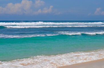 Melasti Beach is beautiful with white sand and blue sea water