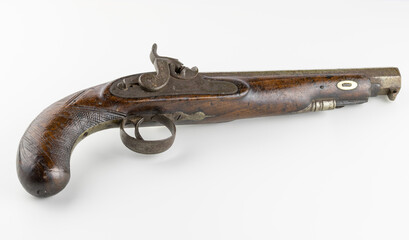 Vintage flintlock pistol isolated on white background