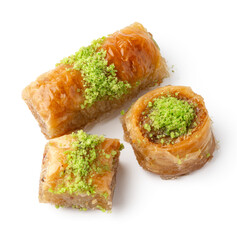 Delicious traditional dessert featuring flaky pastry and nut filling served with a sweet syrup