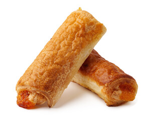 Freshly baked flaky pastry rolls filled with sweet apricot preserves on a clean surface