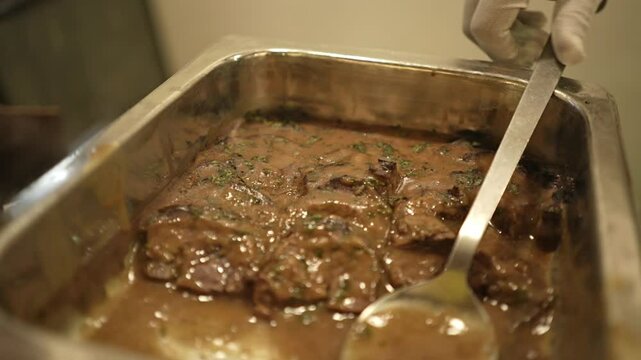 Mutton roast prepared with rum in Bengali style. 