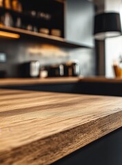 Close-up of a sleek, modern kitchen's wooden countertop.
