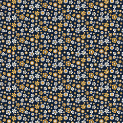 Seamless pattern with daisies on a dark blue background