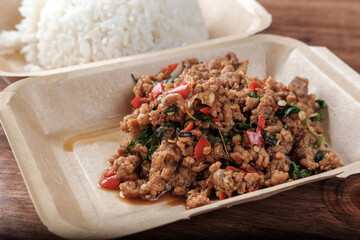Stir-fried pork with Holy Basil (Pad Kra Pao Moo), Thai Food Served with Rice, Ready to Eat