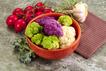 Raw cauliflower different colors heap