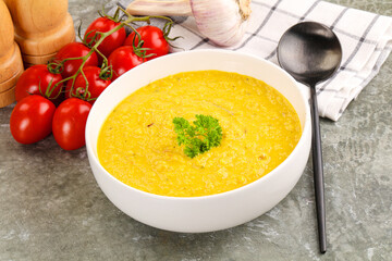 Vegetarian corn cream soup served parsley