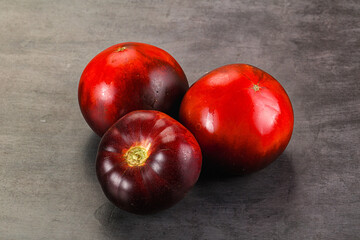 Black ripe juicy organic tomato