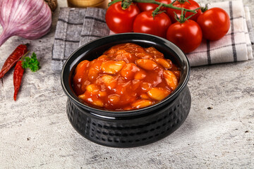 Baked kidney with tomato sauce
