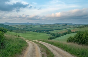 Obraz premium Tuscany Dirt Road Winding Through Rolling Hills