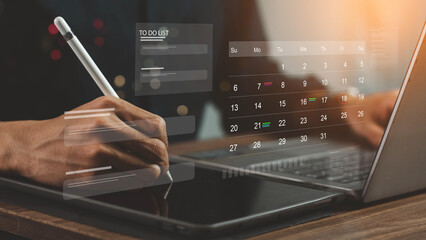Business Planning Calendar and Project management concept. Businessman manages time for effective work. Calendar on the virtual screen interface. Time management. Reminder appointment.
