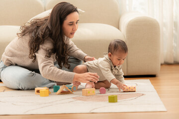 Fototapeta premium Parents and children relax during their holiday at home