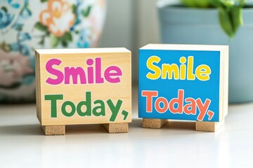 A mini wooden calendar block set with vibrant positive words like "Smile Today," displayed on a light desk.
