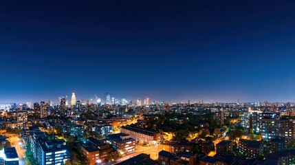 Fototapeta premium A city nightscape with buildings powered by renewable energy.