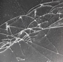 A broken window with a jagged edge