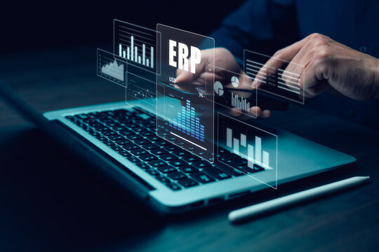 Business people using a laptop with document management for ERP. Enterprise resource planning concept,Enterprise Resource Management ERP software system for business resources plan presented.