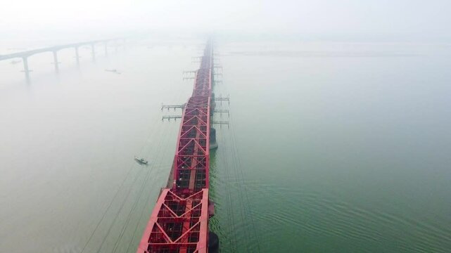 Hardinge Bridge is a Steel Railway Old Bridge over the Padma River in Ishwardi, Pabna, Bangladesh.Hardnge bridge in Foggy Winter morning.