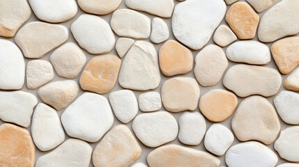 Smooth, irregular cobblestones in various shades of beige and cream create natural, textured surface. This design evokes sense of warmth and rustic charm, perfect for enhancing any space