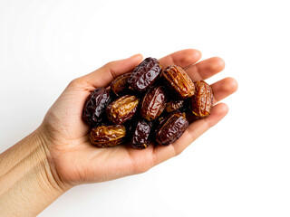 Full of dates in one hand on a white background