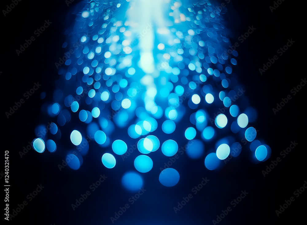 Poster abstract image of blue bokeh lights, resembling a cascading waterfall of light against a dark backgr