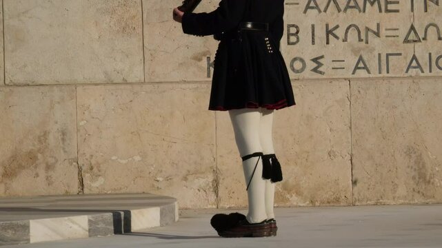 Athens, Greece Evzones 04.02.2025 Greek Presidential Guard in national clothes uniform at the tomb of unknown soldier in Athens, Greece. Ceremonial ritual changing guards, aerial shot