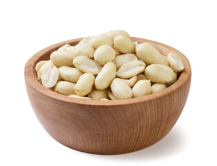 Peeled almonds in a wooden plate close-up on a white. Isolated