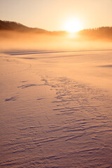 sunrise over the snow field