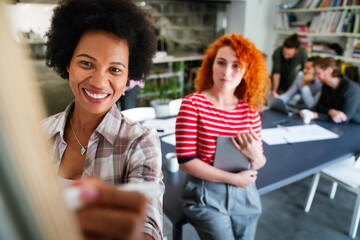 Diverse startup people on meeting having fun during brainstorming new ideas for their new project.