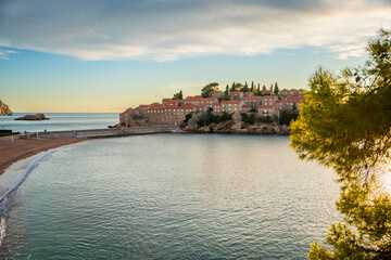 Sveti Stefan island near Budva at sunset light in winter time. Closed resort in Montenegro