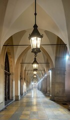 Kraków: Podcienia Sukiennic w mglisty poranek z zapalonymi lampami