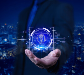 Businessman chatting with AI or artificial intelligence technology. A man uses a laptop computer to chat with an intelligent AI.