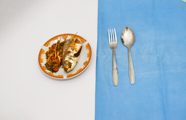 Steamed Fish with Stir fried Bitter Melon on a Plate