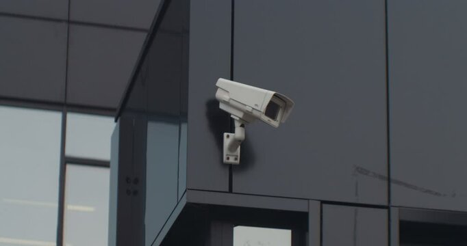 NEW YORK - April 5, 2017:White candid camera working 24 hours a day. Large international corporation looking after security of organization. Outdoors. Surveillance.