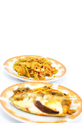 Steamed Fish with Stir Fried Bitter Melon on Plates
