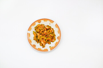 Overhead Shot of Steamed Fish and Stir Fried Bitter Melon on a White Plate