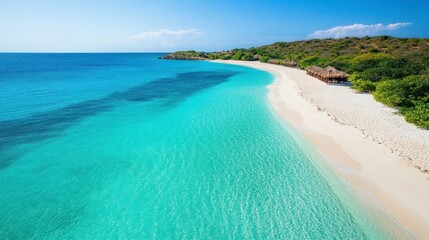 A pristine beach with clear turquoise waters, surrounded by lush greenery and a blue sky, offering a perfect tropical getaway.