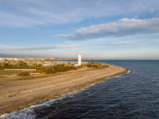 Fototapeta premium Faro Guardias Viejas o Punta de los Baños en el Ejido, Almeria, Andalucia