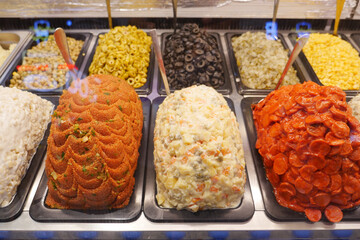 Variety of Salad Meals Displayed in a Restaurant Food Bar Serving Area