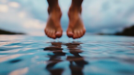 Obraz premium Minimalist Water Reflection Barefoot Person on Rippling Surface - Modern Zen Aesthetic and Tranquil Lifestyle Imagery for Mindfulness Campaigns in Digital Wellness Marketing