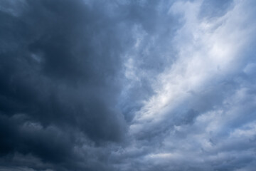 A captivating and breathtaking view of a stormy sky that is filled with ominous dark clouds...