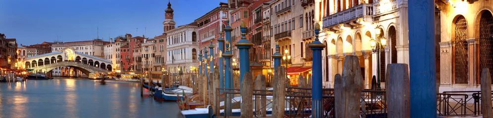 Rialto Bridge and grand canal at sunset , Venice, Italy 