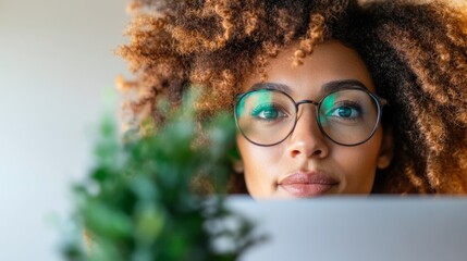 Contemporary Inclusion Afro Hair Glasses Wearer Engages with Smart Tech for Innovative Multiracial Teamwork in Modern Collaborative Office Setting