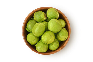Fresh brussels sprouts in wooden bowl on white background