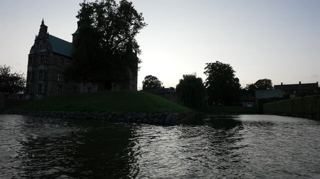 Copenhagen's Rosenborg Castle, Surrounded by Lush Greenery and a Tranquil Moat