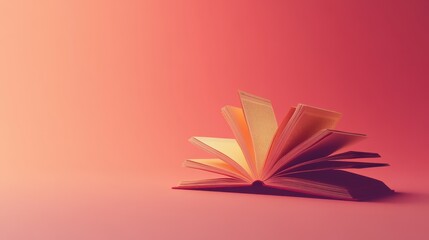 Open book pages fanned on pink background