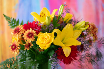 Valentine's Day Women's Day birthday holiday party. Close up cropped photo of bouquet of flowers isolated on colorful background.