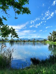 Fototapeta premium Magic photo of a lake reflecting the mountains during a hike in the Swiss Alps