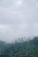 Foggy hill near Dibawah Lake, Alahan Panjang, Indonesia.