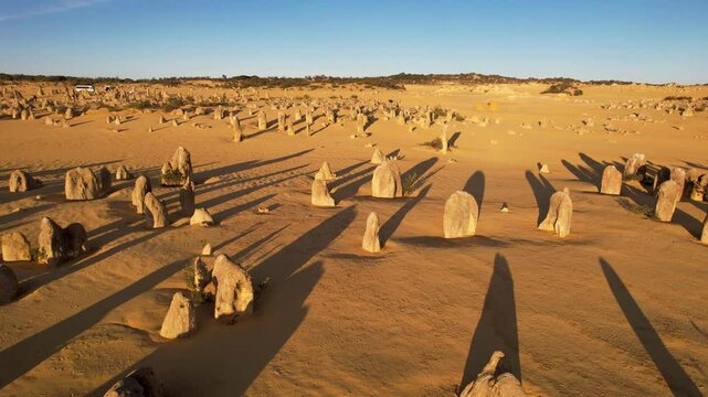 Aerial view of breathtaking rock formations and vast sand patterns in the Pinnacles Desert, Nambung National Park, Western Australia.